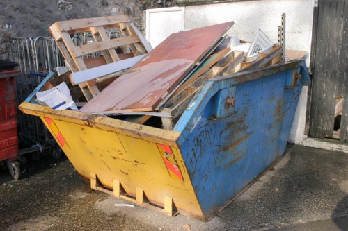 Professional team performing loft clearance in a Bayswater home